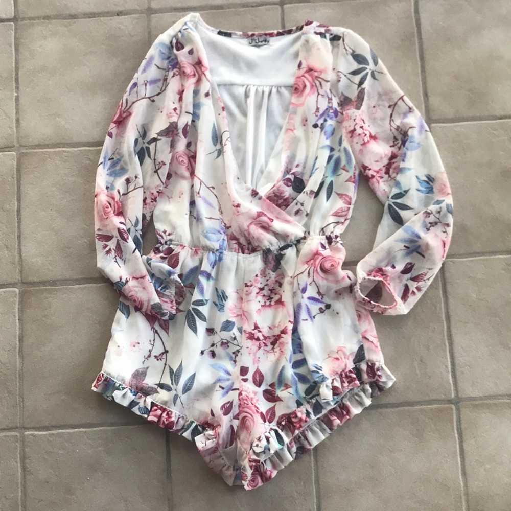 Floral romper long sleeve ruffle bottom